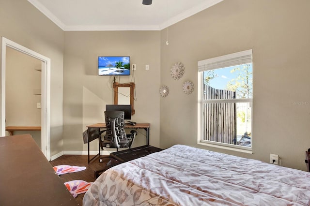 bedroom with crown molding and dark wood-type flooring