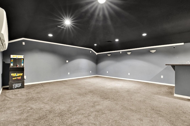 empty room with carpet flooring and lofted ceiling