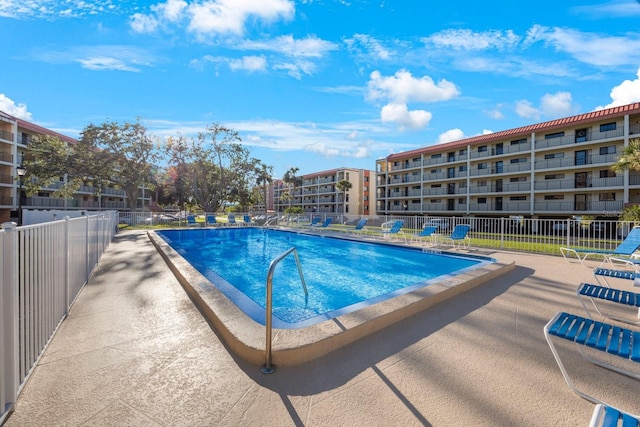 view of pool featuring a patio