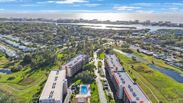 drone / aerial view with a water view