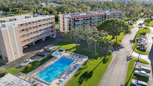 9433 Harbor Greens Way Unit 403, Seminole, FL 33776 - aerial view of a pool area and a tree filled landscape