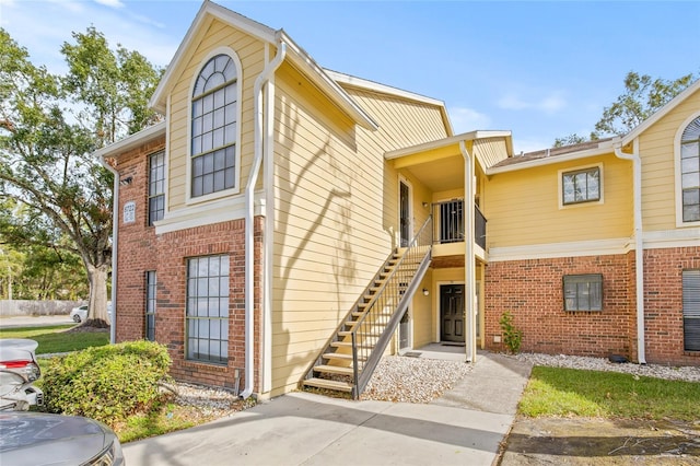 8722 Mallard Reserve Dr Unit 204, Tampa, FL 33614 - view of property featuring stairs