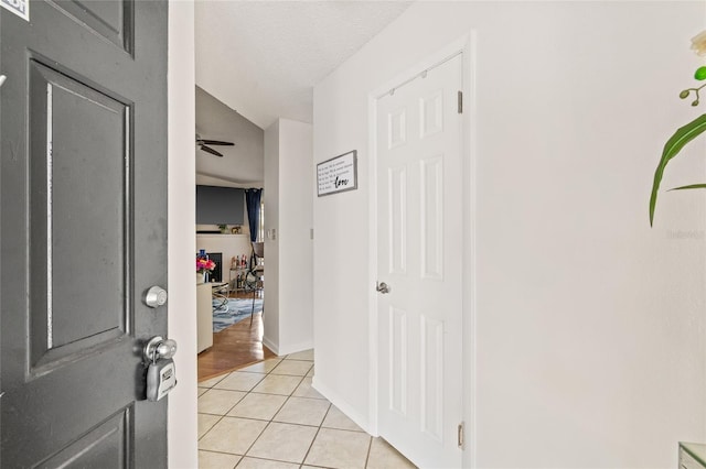 8722 Mallard Reserve Dr Unit 204, Tampa, FL 33614 - entrance foyer with light tile patterned floors and baseboards
