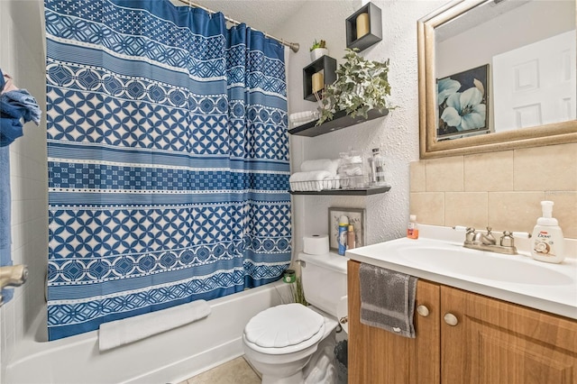 full bathroom with tasteful backsplash, a textured ceiling, vanity, shower / tub combo with curtain, and toilet