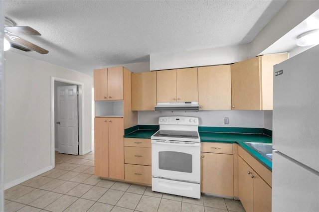 kitchen featuring light tile patterned flooring, white appliances, sink, and light brown cabinetry