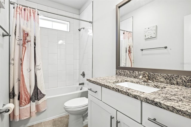 full bathroom featuring tile patterned flooring, vanity, toilet, and shower / tub combo with curtain