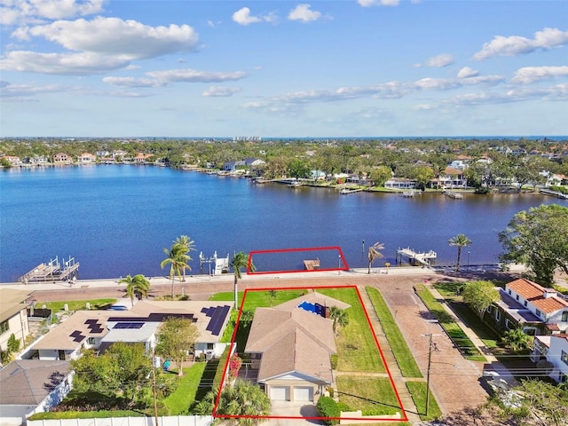 drone / aerial view with a water view