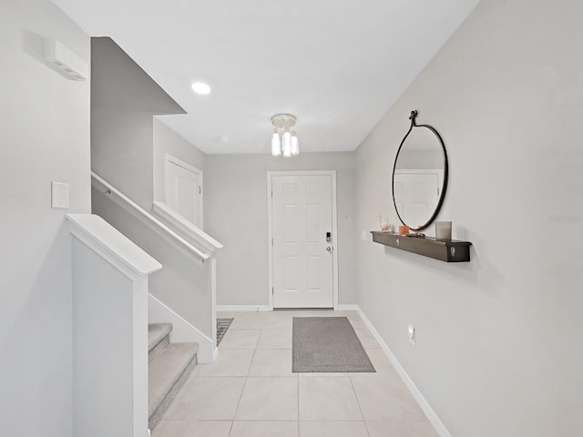 view of tiled foyer entrance