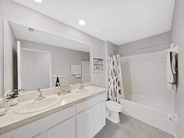 full bathroom with tile patterned floors, shower / bath combo, toilet, and vanity