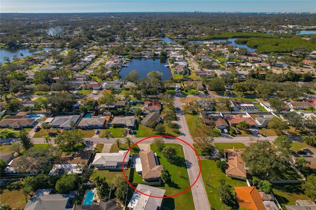 bird's eye view with a water view