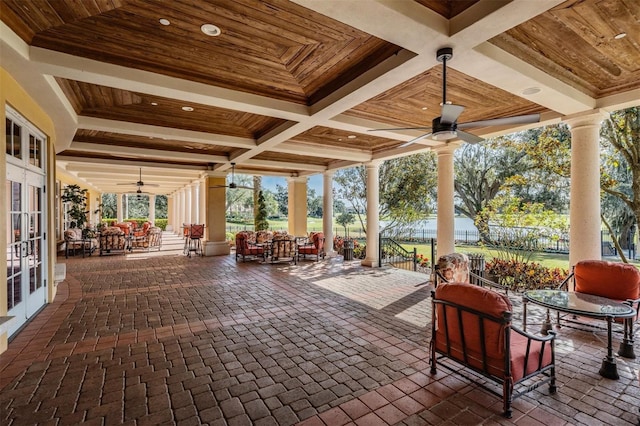 view of patio / terrace with ceiling fan and french doors