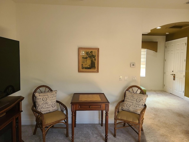 living area with carpet floors