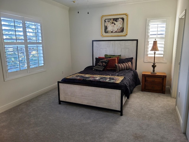 carpeted bedroom with crown molding