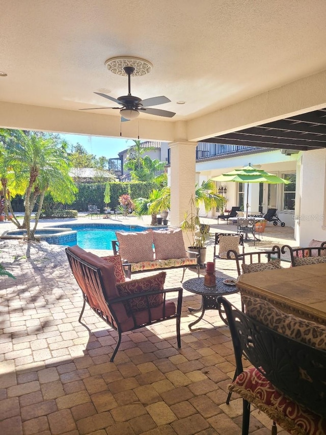 view of patio / terrace featuring an outdoor hangout area and ceiling fan