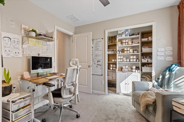 office area featuring ceiling fan and light colored carpet