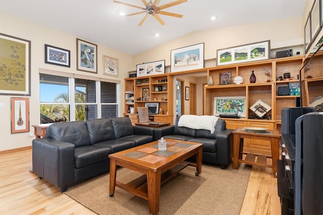 living room with ceiling fan, lofted ceiling, and light wood-type flooring