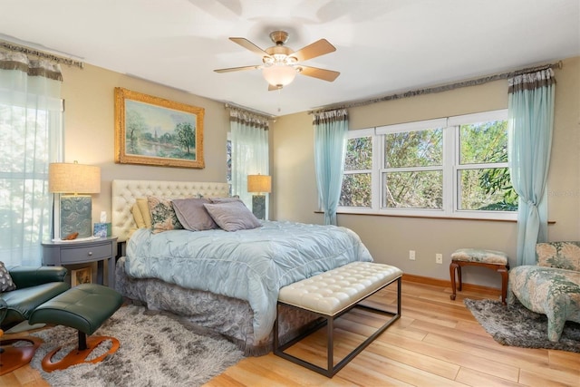 bedroom featuring ceiling fan and light hardwood / wood-style flooring