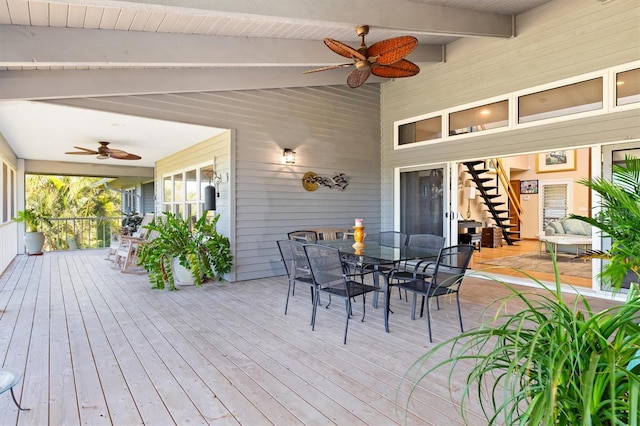 wooden terrace featuring ceiling fan