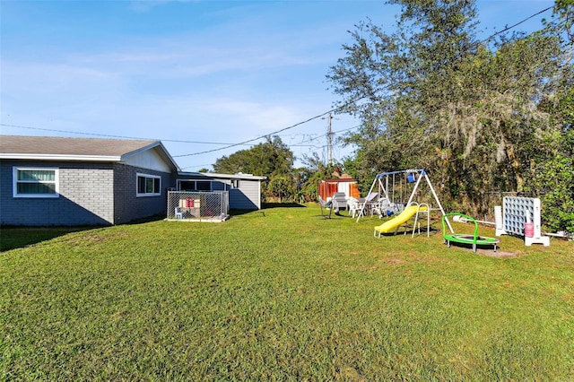 view of yard featuring a playground