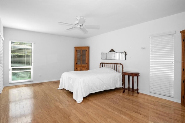 bedroom featuring ceiling fan and light hardwood / wood-style floors