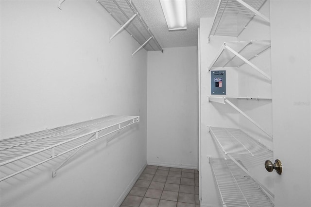 walk in closet featuring tile patterned floors