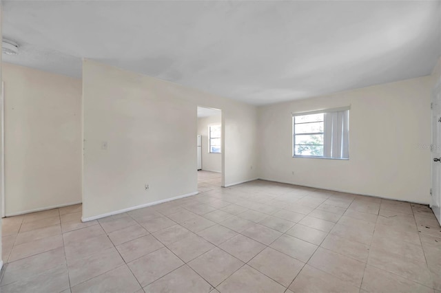 view of tiled spare room