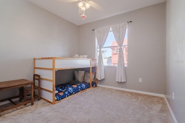 bedroom featuring ceiling fan and carpet floors