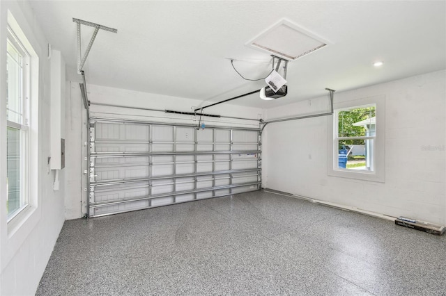 2735 36th Ave N, Saint Petersburg, FL 33713 - garage featuring a garage door opener