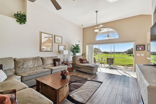 living room featuring hardwood / wood-style floors and high vaulted ceiling