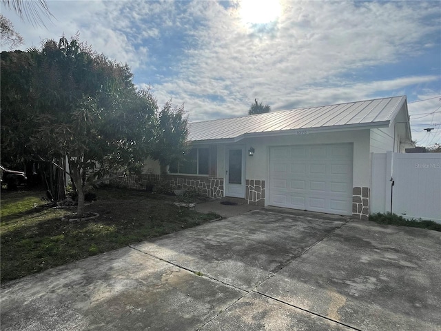 ranch-style home with a garage