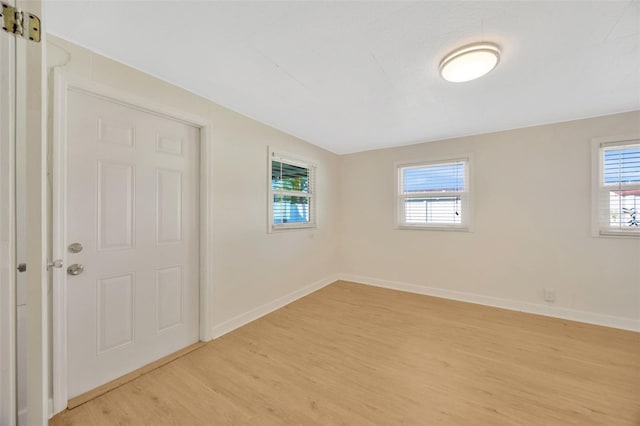 6598 26th St N, Saint Petersburg, FL 33702 - unfurnished room featuring plenty of natural light and light wood-type flooring