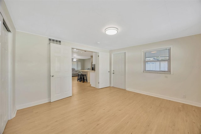 6598 26th St N, Saint Petersburg, FL 33702 - unfurnished room featuring light wood-type flooring