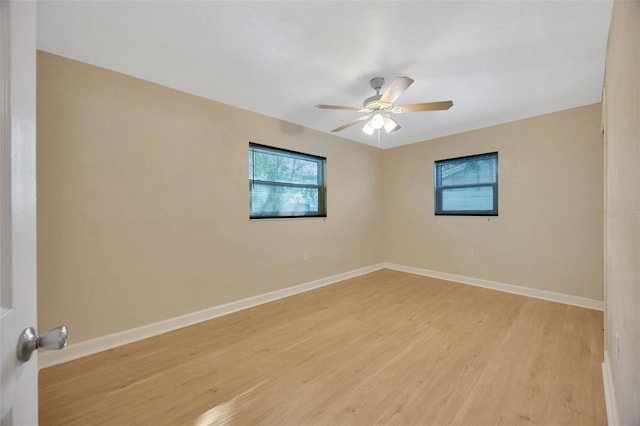 6598 26th St N, Saint Petersburg, FL 33702 - spare room with light hardwood / wood-style floors and ceiling fan