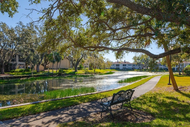 surrounding community with a water view