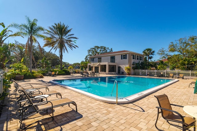 view of swimming pool featuring a patio