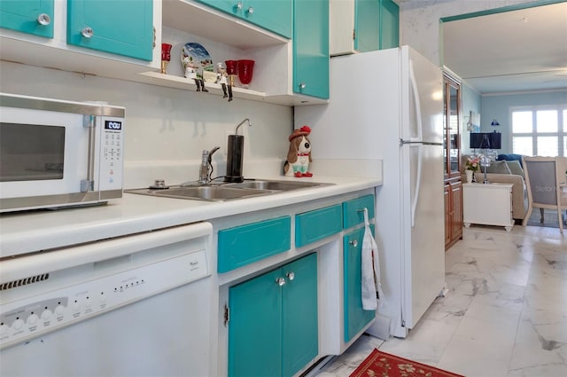 kitchen with sink and white appliances