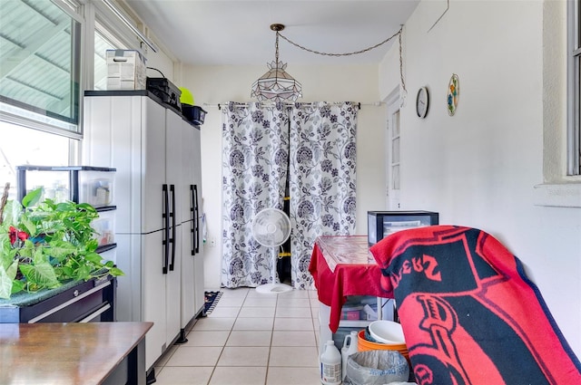 interior space with light tile patterned floors