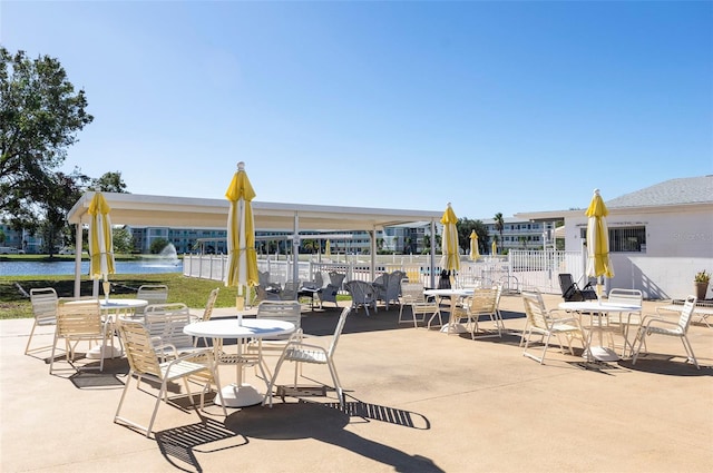 view of patio / terrace featuring a water view