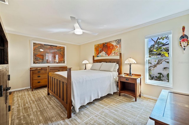 bedroom with ceiling fan and ornamental molding