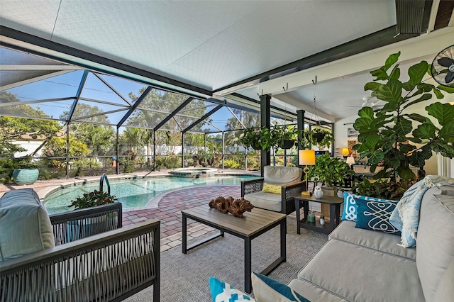 view of pool with an outdoor hangout area, ceiling fan, a lanai, an in ground hot tub, and a patio