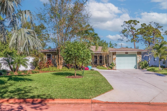 view of front of home with a garage and a front yard