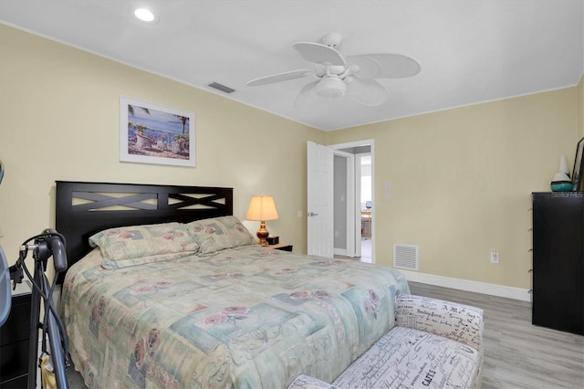 bedroom featuring ceiling fan and light hardwood / wood-style floors