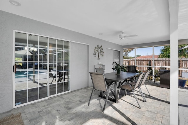 dining area with ceiling fan