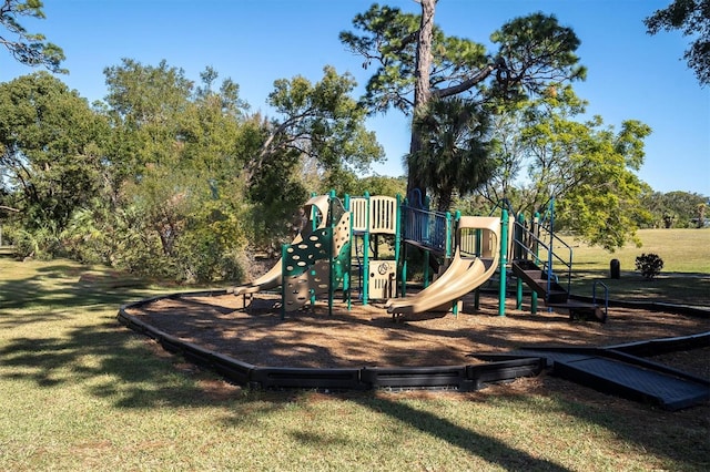 view of play area featuring a lawn