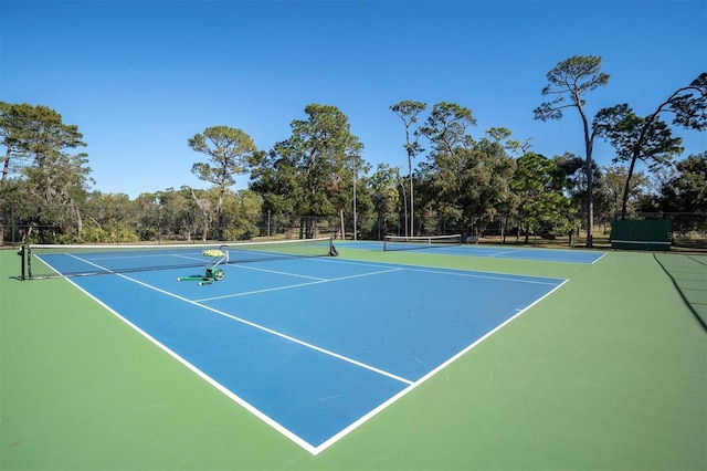 view of tennis court with basketball court