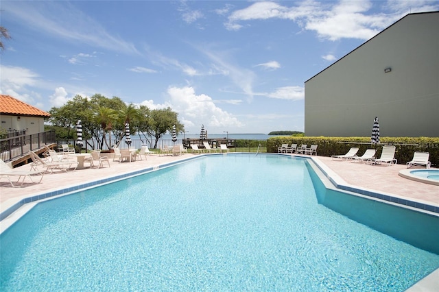 view of pool featuring a patio area