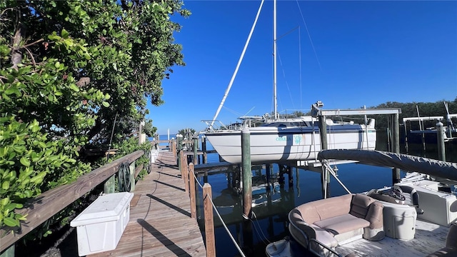 dock area featuring a water view