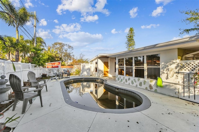 view of swimming pool featuring a patio