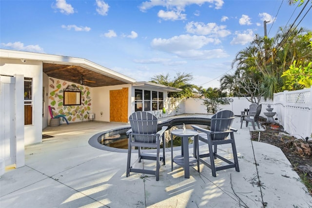 view of patio with ceiling fan