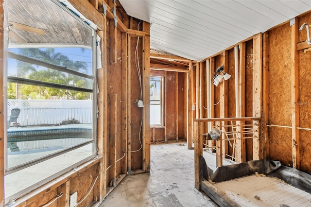 misc room featuring plenty of natural light and lofted ceiling